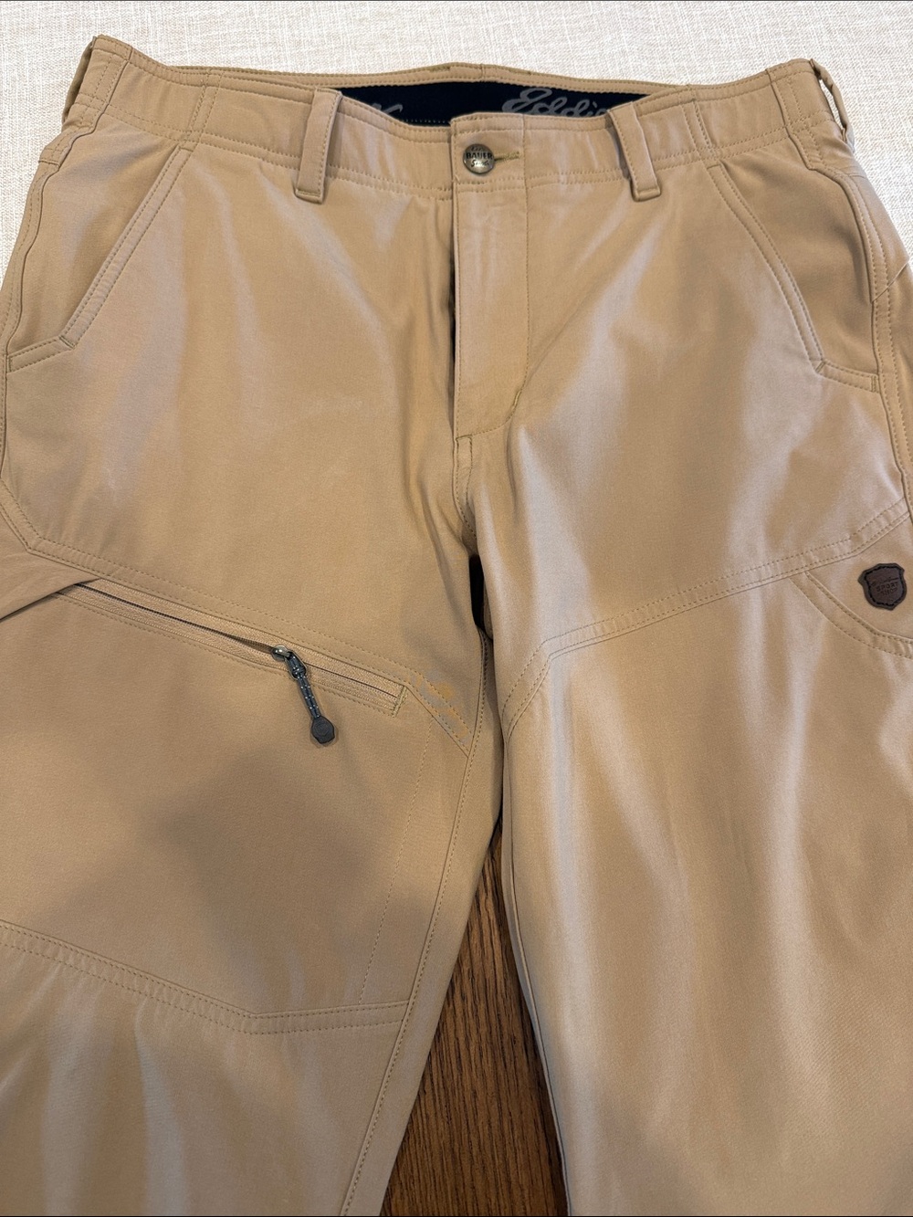 Eddie Bauer Men's Tan Cargo Pants with Zippered Thigh Pocket great for travel.